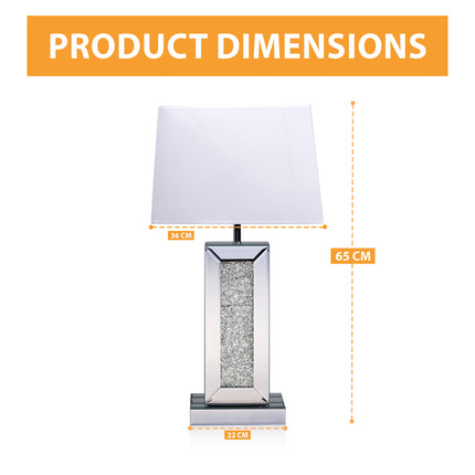 Table lamp featuring a reflective mirrored glass base