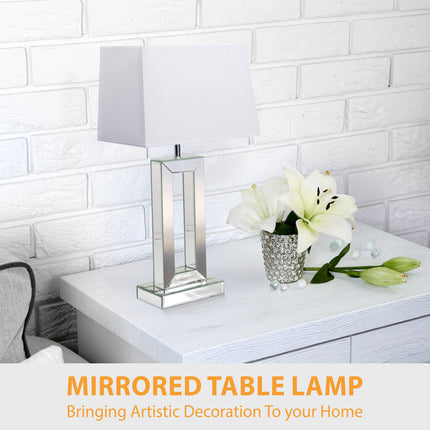 Modern mirrored table lamp with chic design for contemporary interiors.