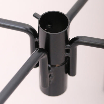 Bird feeder pole anchor with four ground spikes for stability