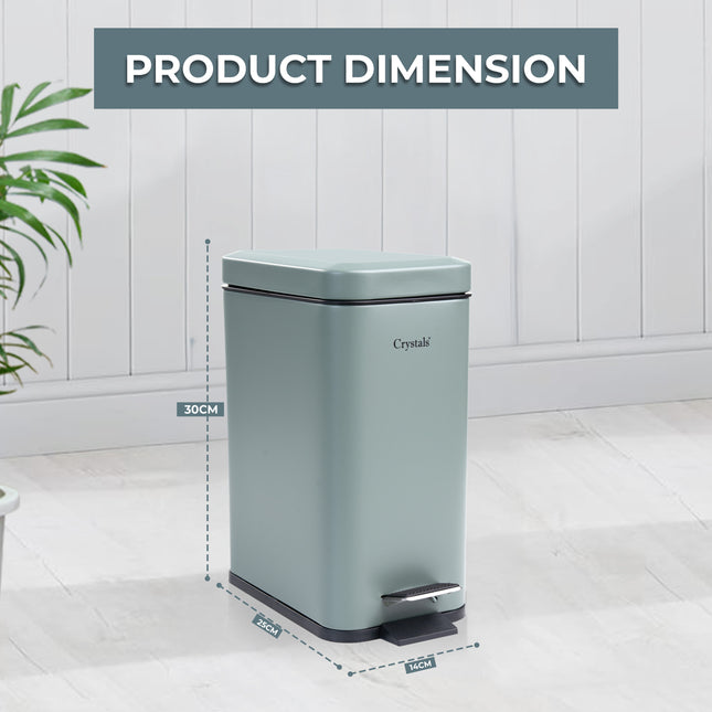 Compact 5L bin next to office desk
