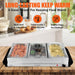 Three warming trays with clear lids on this Electric Buffet Food Warmer, designed to keep food at the ideal temperature.