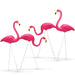 Flamingo lawn decor with metal spikes for secure garden placement.