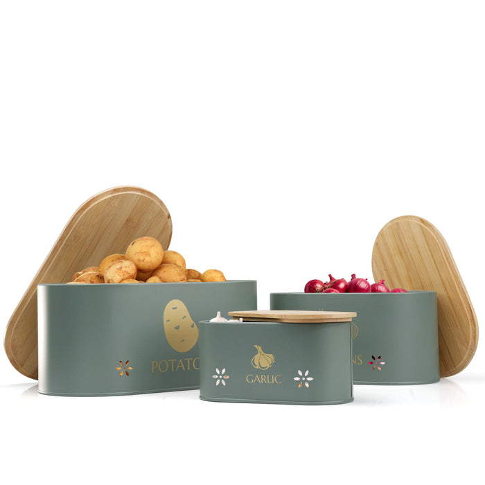 Set of 3 metal vegetable storage tins for potatoes, onions, and garlic.