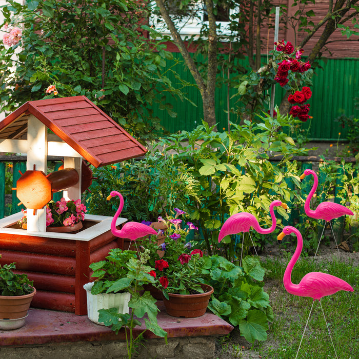 Outdoor flamingo lawn ornaments made from sturdy PE plastic.