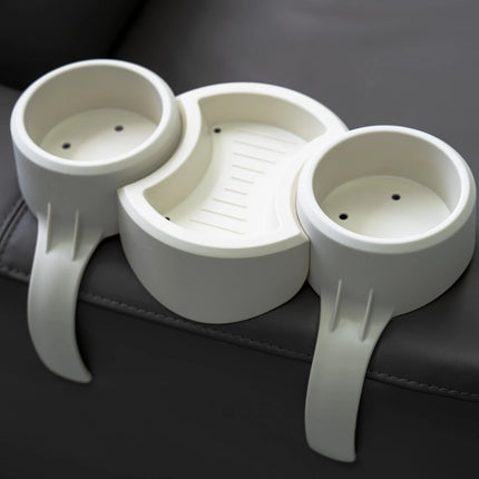 White plastic organizer with three compartments on a dark surface