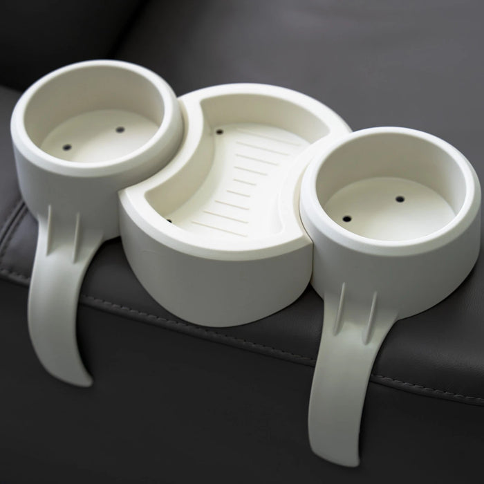 White plastic organizer with three compartments on a dark surface