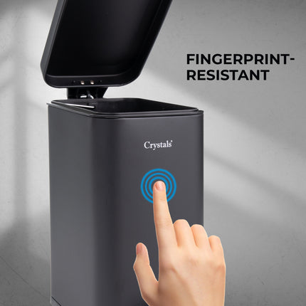 Compact black bin with pedal, perfect for small room spaces